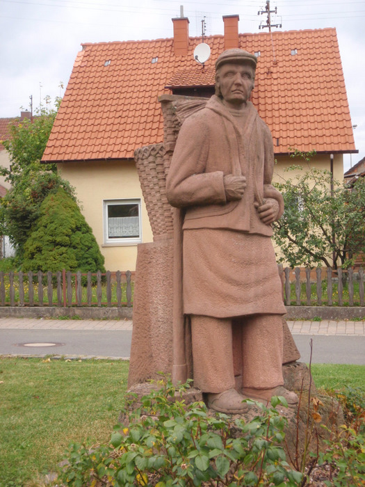 grape picking sculpture.